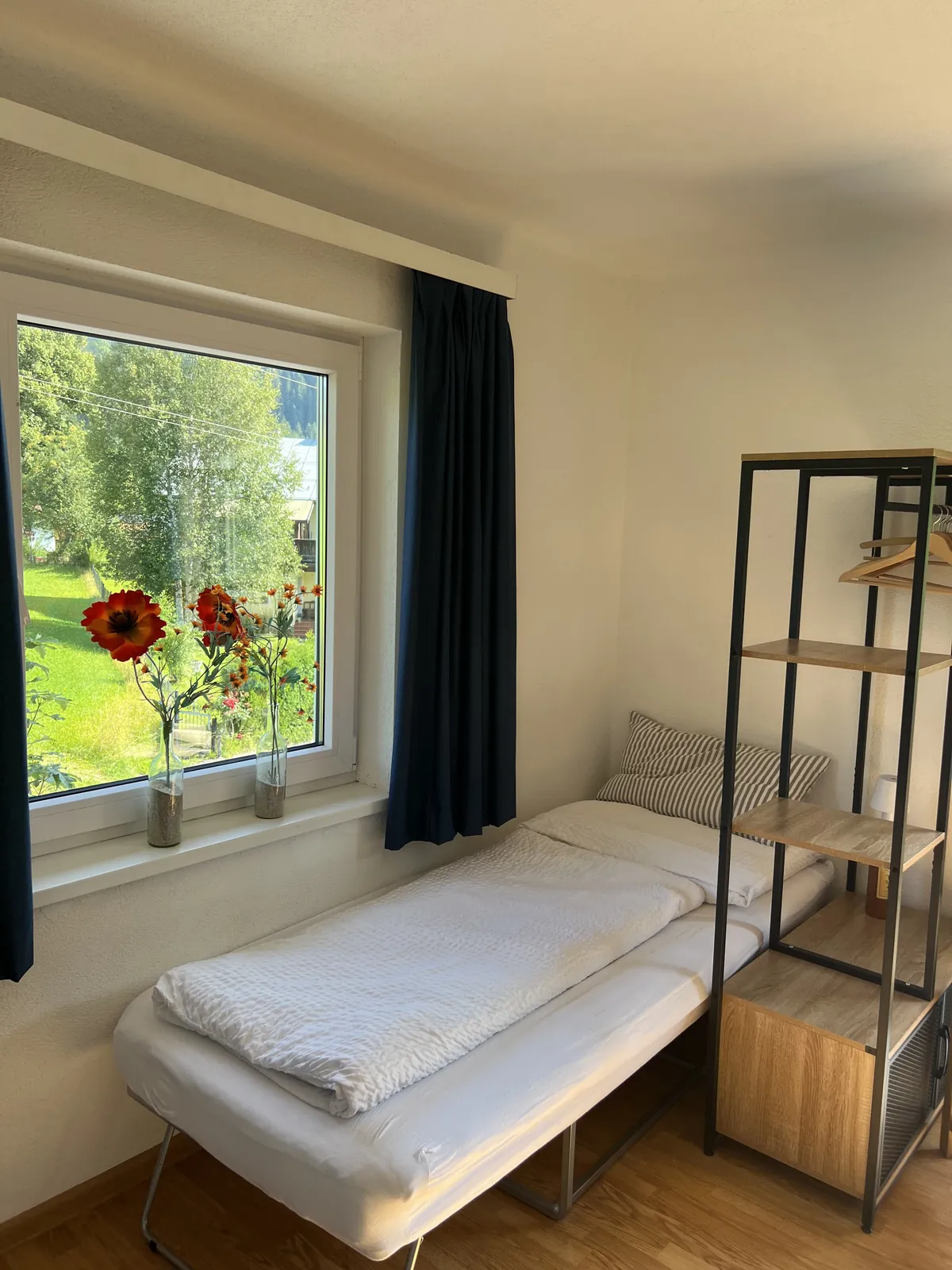 Slaapkamer met uitzicht op de weide